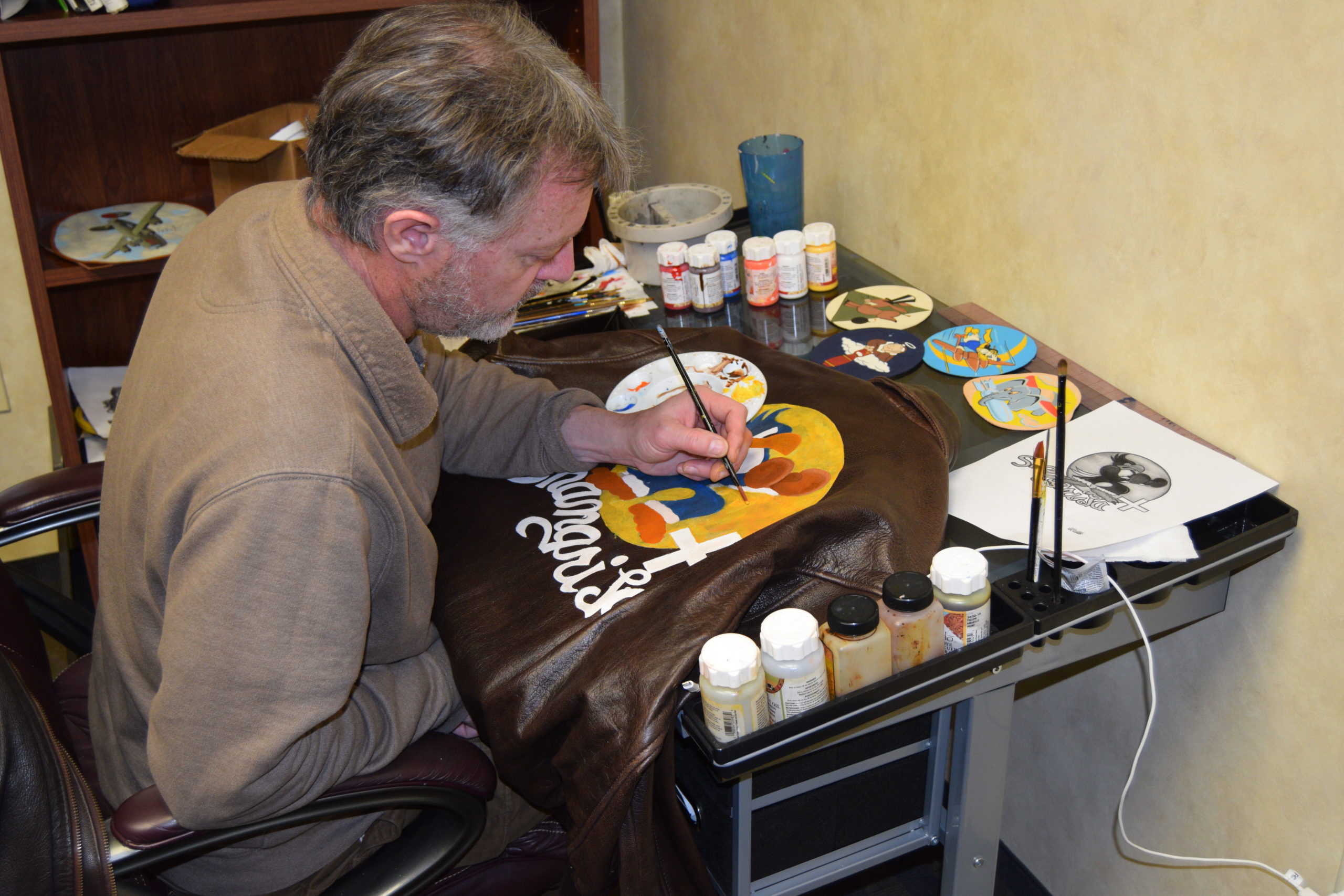 Jim Harley in his studio painting