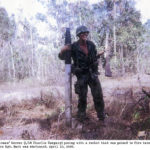 tom "pointman" mercer (1/18 charlie company) posing with a rocket that was poised to fire into Lai Khe, where Sgt. hack was stationed. April 10, 1968.