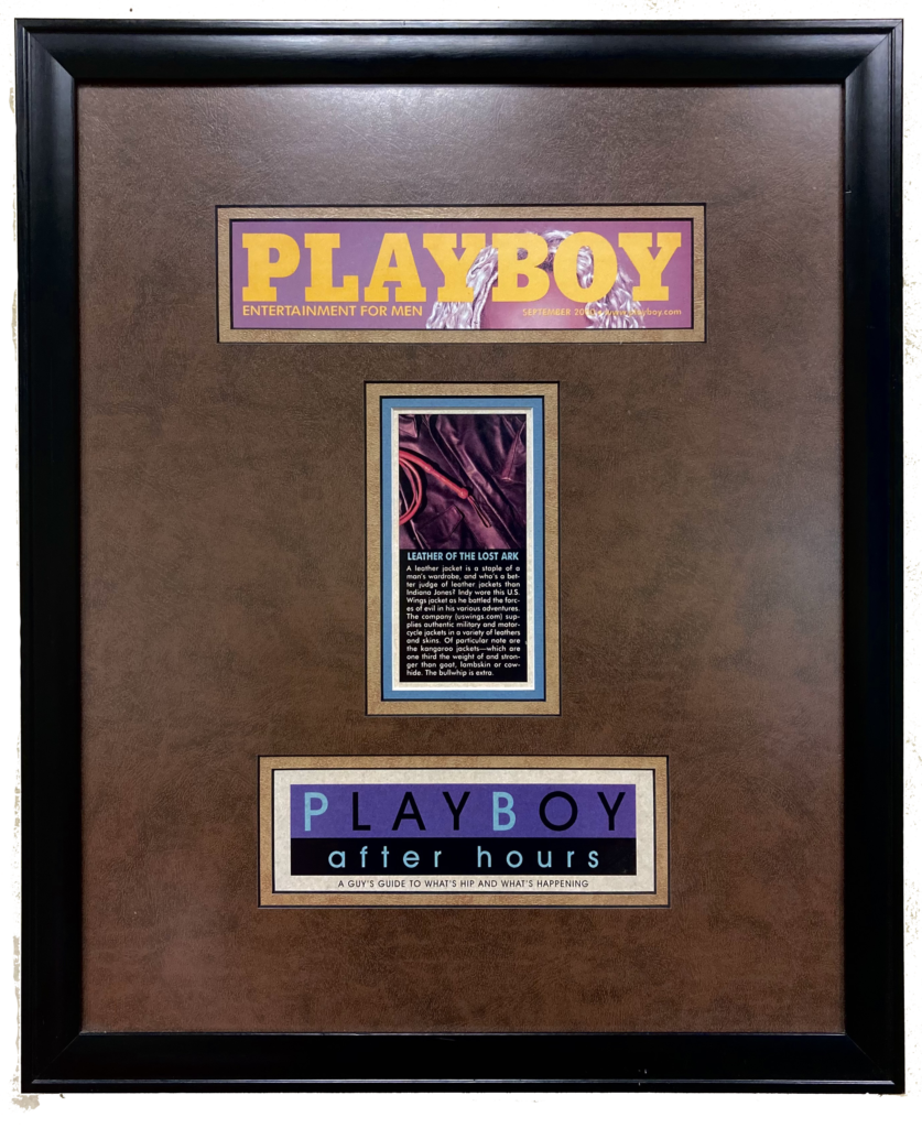 a framed playboy article saying the us wings indiana jones jacket is in style